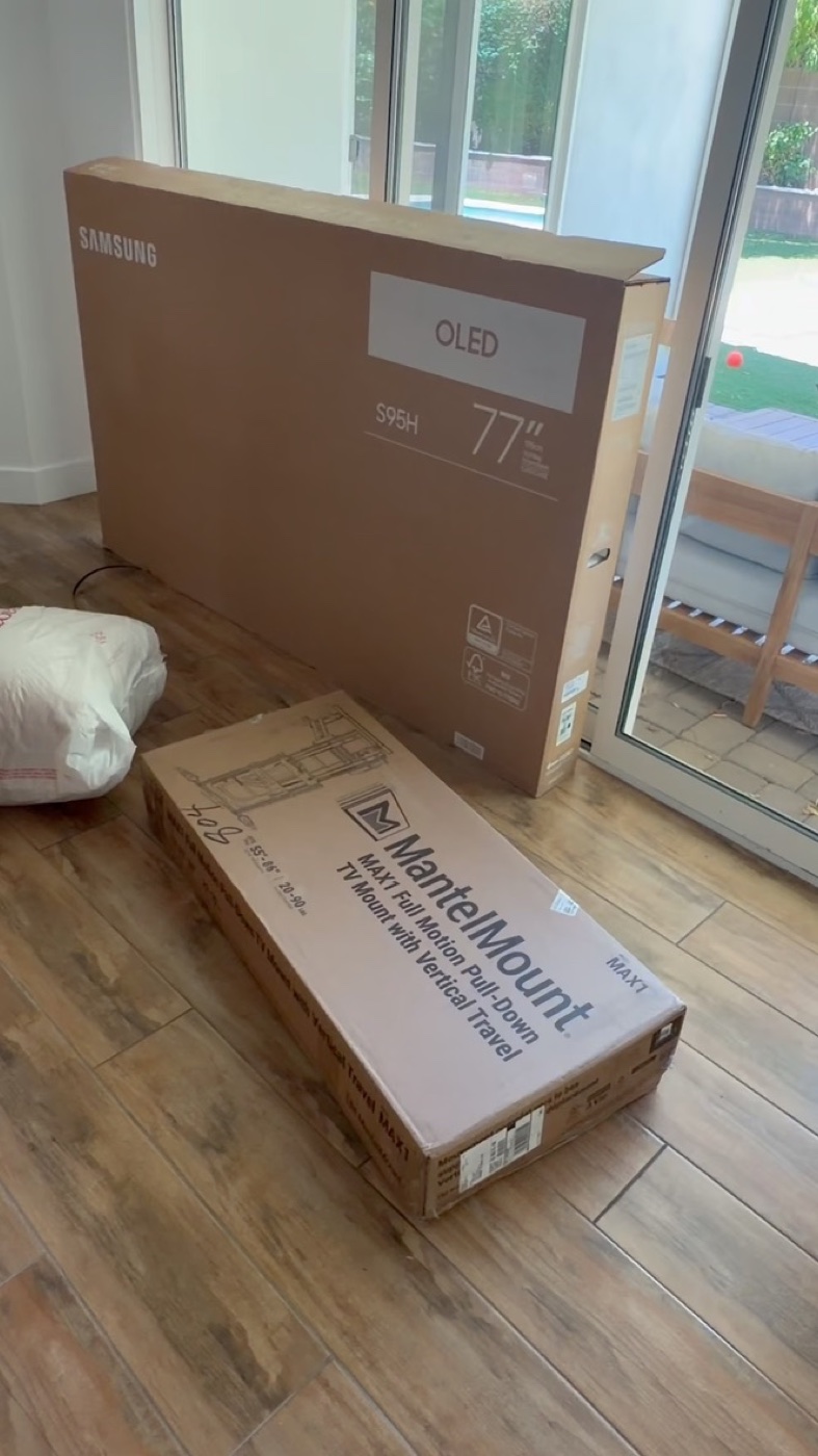 The MantelMount MAX and 77-inch Samsung S95H arrived for the install.