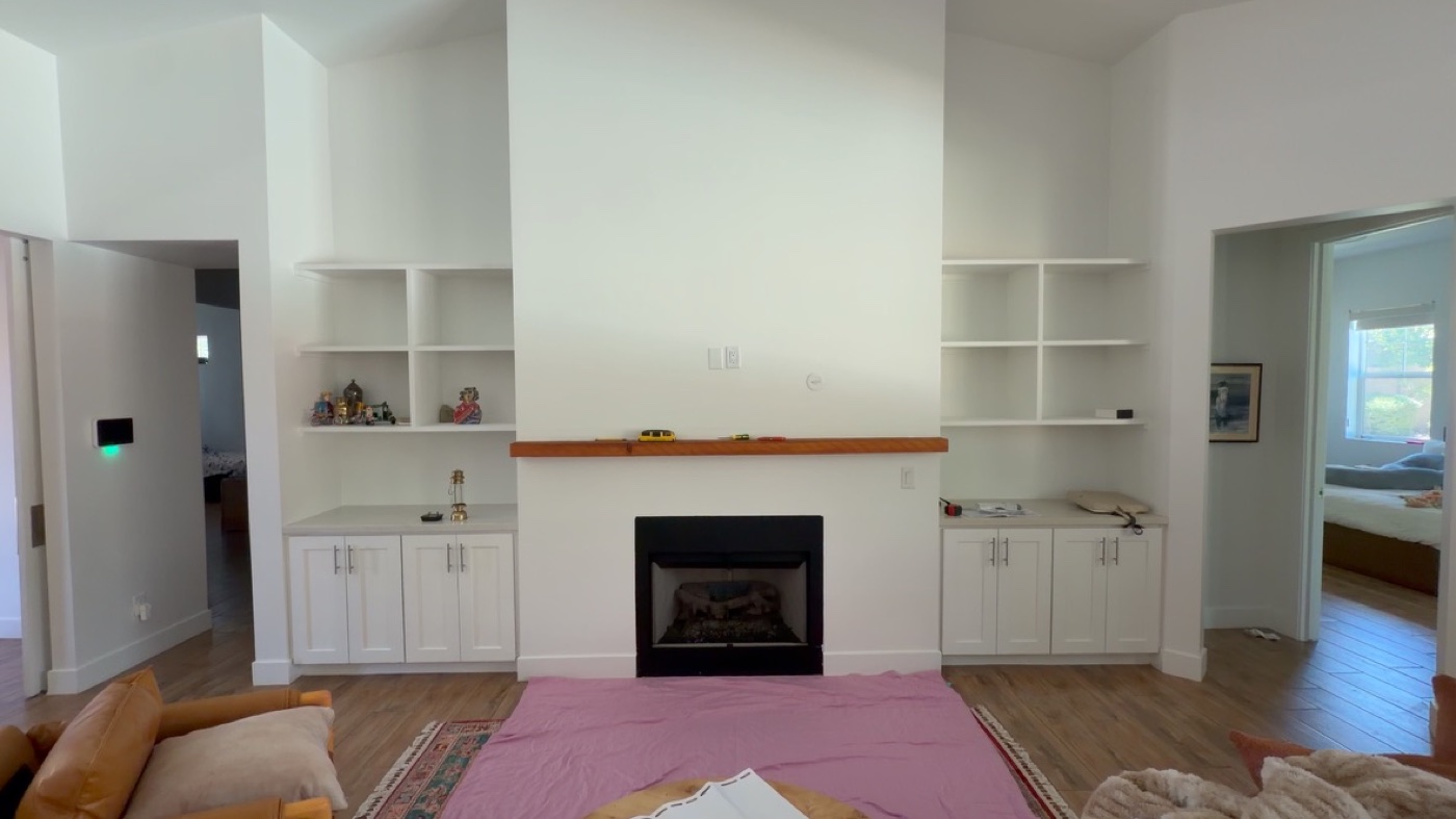 The fireplace wall before any work was done.