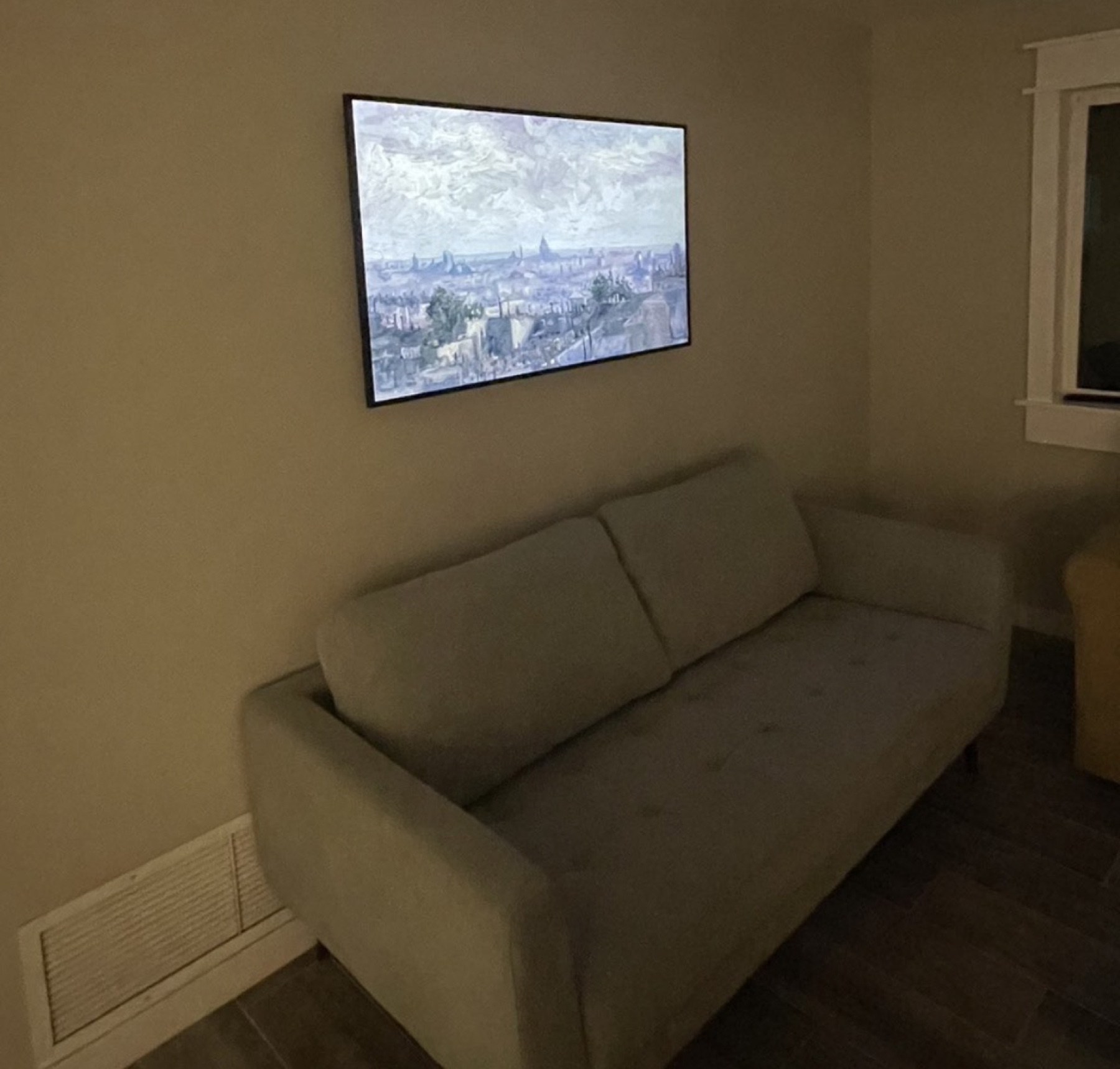 Frame TV over sofa
