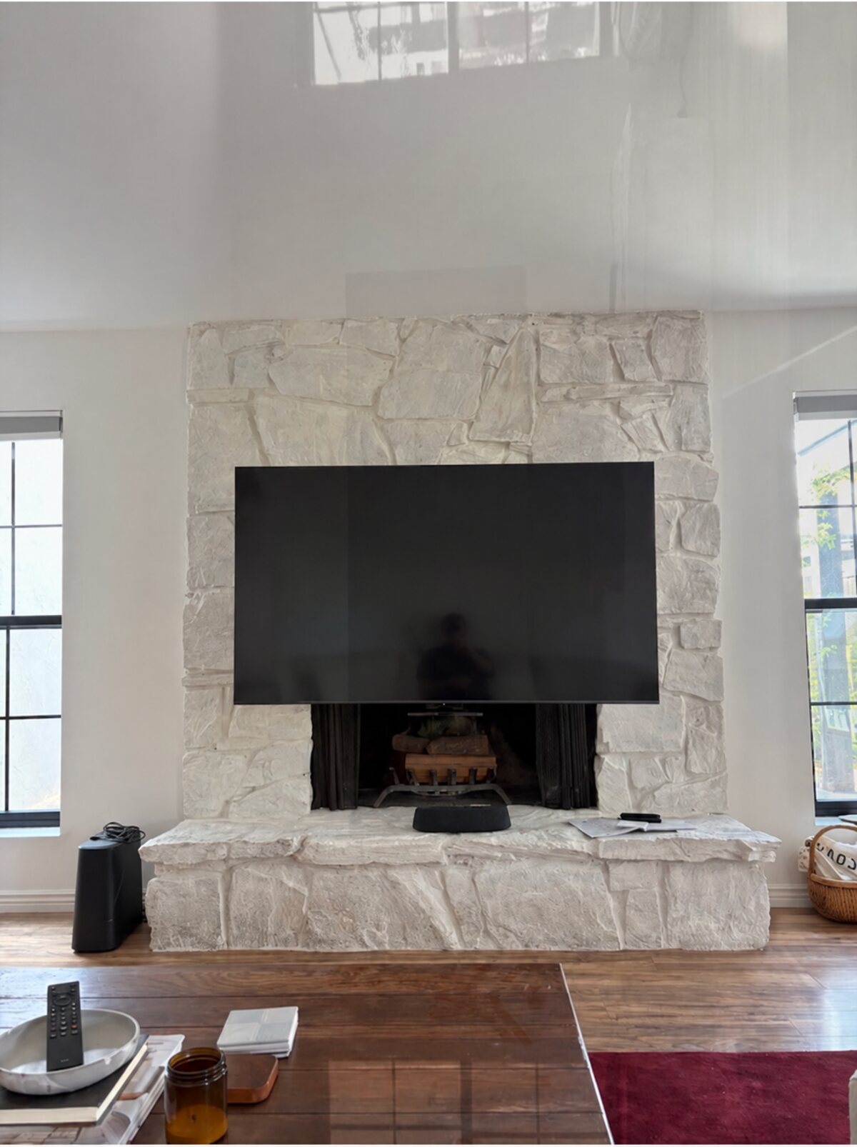 Finished MantelMount installation on a stone fireplace