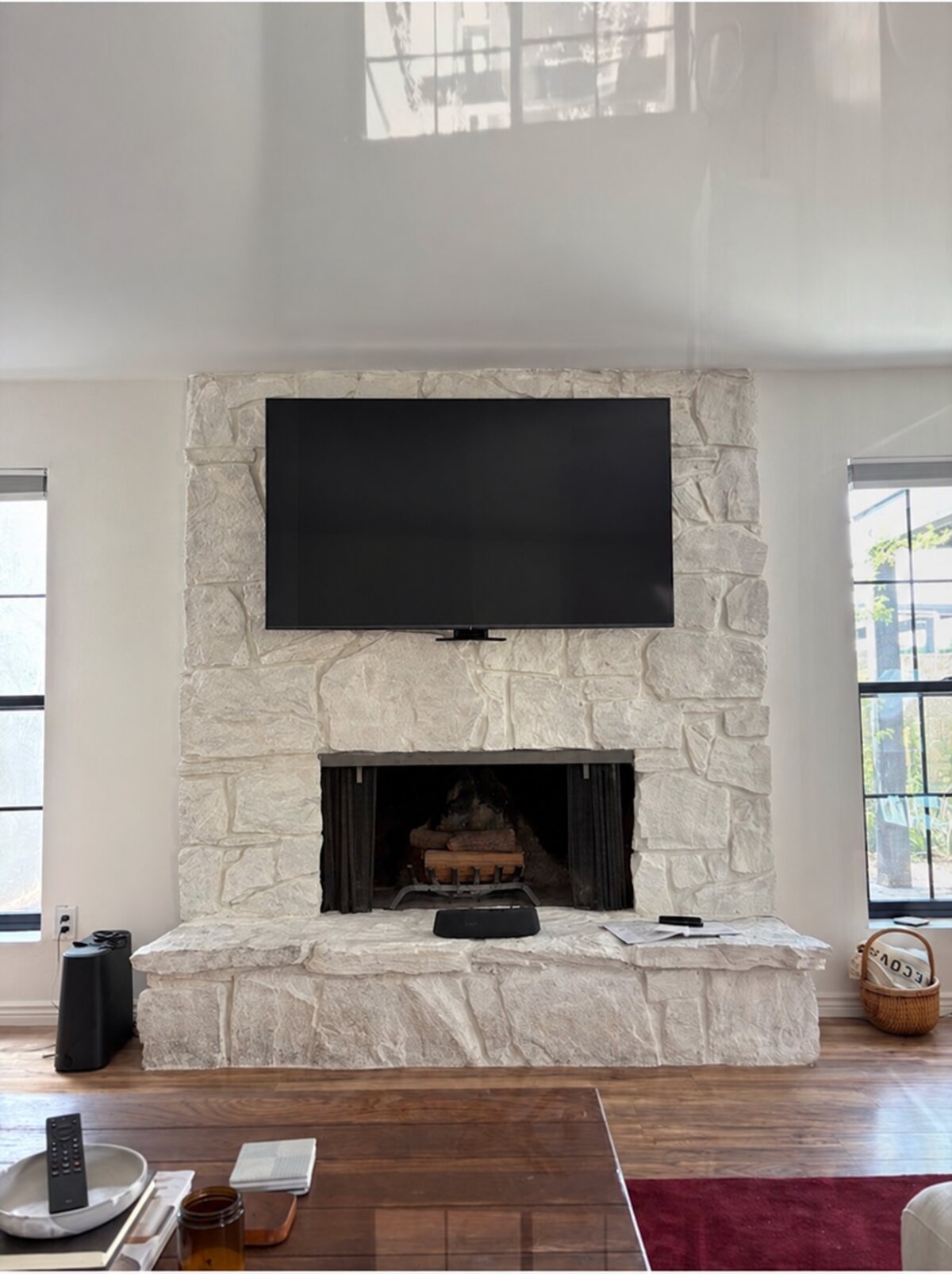 Raised MantelMount on a stone fireplace