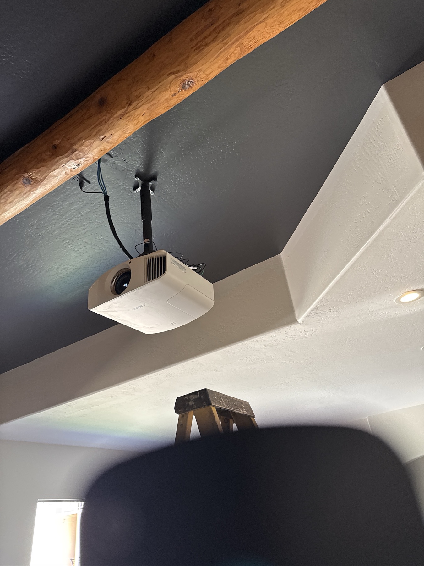Ceiling-mounted home theater projector